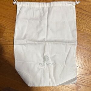 Versace Ivory Dust Bag with Logo with drawstring closing as you see ..